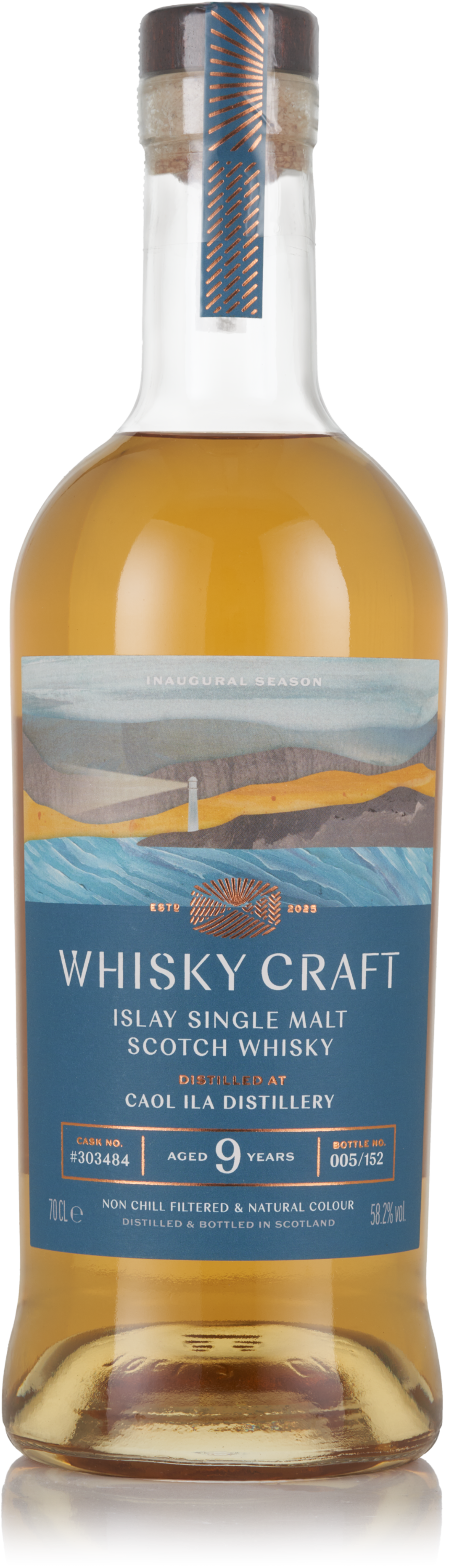 Bottle of Whisky Craft Islay Single Malt Scotch Whisky. It's aged 9 years, has a blue coastal illustration and the liquid is a light honey colour.